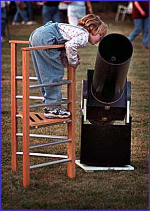 Libby looks at the moon. (C)1999 ICSTARS Astronomy.