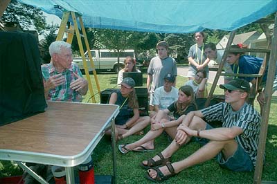 Chuck talks to students.