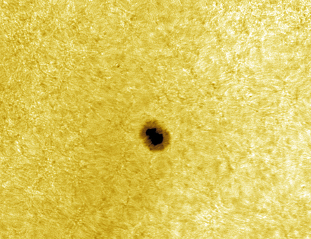Sunspot 1115 in He D3
